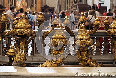 Detail of Candles burning inside a cathedral in rome Editorial Stock Photo