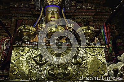 Ornate Golden Buddha altar at Pelkor Chode Monastery, Gyantse, Tibet Stock Photo