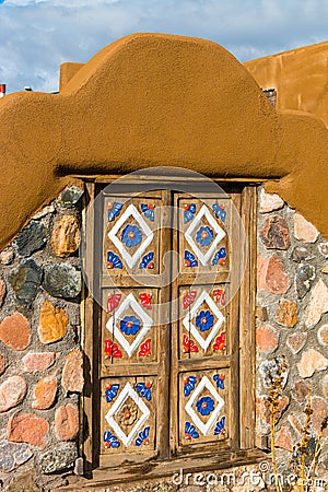 Ornate Hand Carved Gate On Pueblo Style Building Editorial Stock Photo