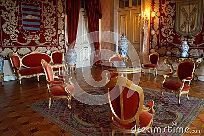 Ornate interiors of the Ajuda Palace, the Red Waiting Room, Lisbon, Portugal Editorial Stock Photo