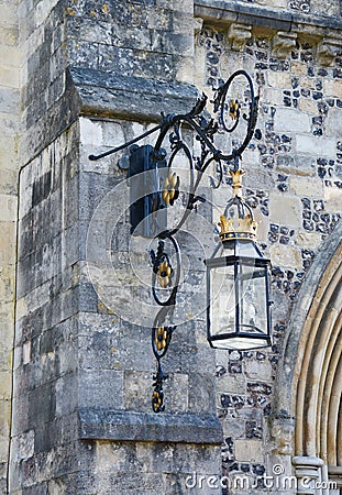 Ornate lantern on a stone wall Stock Photo