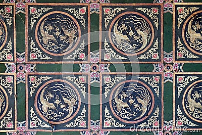 An ornate painted ceiling on a building in the Forbidden City in Beijing Editorial Stock Photo