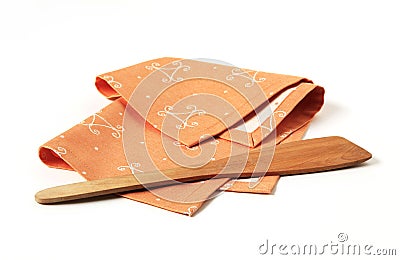 Ornate placemat and wooden spatula Stock Photo