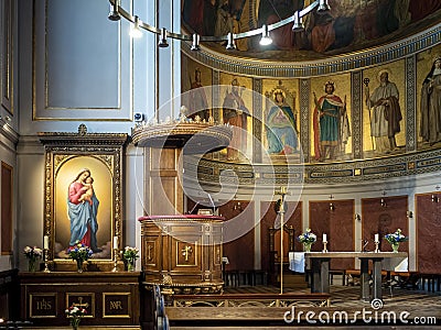 Ornate sermon delivery podium at the altar area of the Sankt Ansgars Kirke Editorial Stock Photo