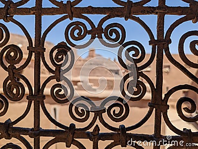 Ornate traditional window grid of a berber house ruin in the city center of Amezrou Stock Photo