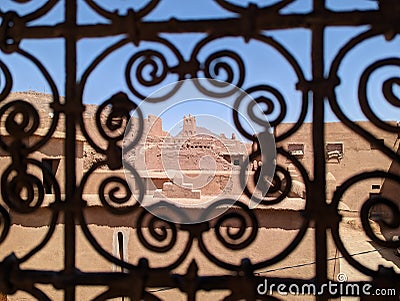 Ornate traditional window grid of a berber house ruin in the city center of Amezrou Stock Photo