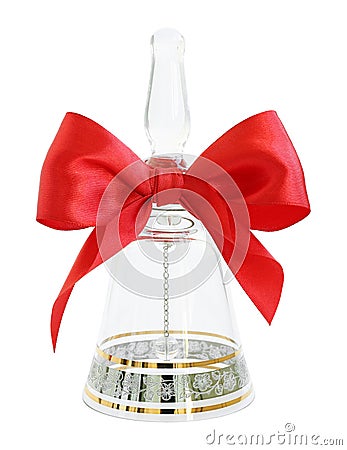 Ornate transparent crystal handbell with a red satin bow Stock Photo