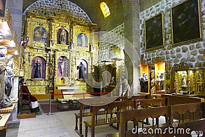 Ornately decorated gold shrine in the chapel Editorial Stock Photo