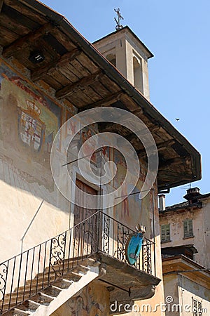 Orta San Giulio, Italy, June 2 2017, close up on the facade on an old decorated building Editorial Stock Photo