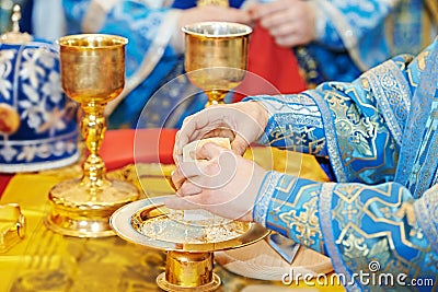 Orthodox Christian euharist sacrament ceremony Stock Photo