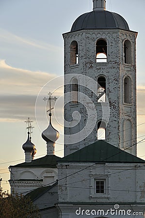 Orthodox Christian white stone Church in Russia on the banks of the Volga river on a summer day in the evening Stock Photo