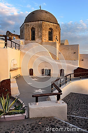 Orthodox Church with Brown Dome in the Evening, Oia, Santorini, Stock Photo