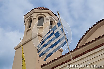 Orthodox churcha and a greek flag Stock Photo