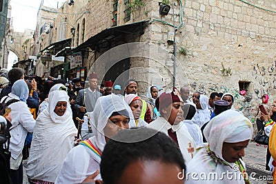 Orthodox Ethiopian Christians mark Good Friday in Jerusalem and carry wooden crosses in a procession along the Via Dolorosa. Editorial Stock Photo