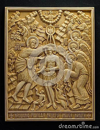 Orthodox icon carved from mammoth Tusk. Stock Photo