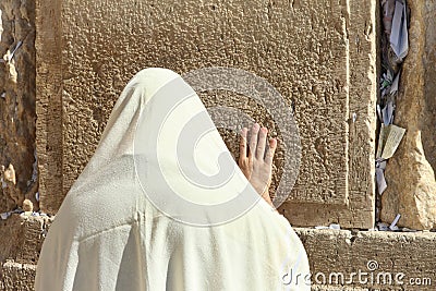 Orthodox Jewish Man prays at the western wall Editorial Stock Photo