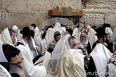 Orthodox Jewish men pray at the Western Wall in Jerusalem Israe Editorial Stock Photo