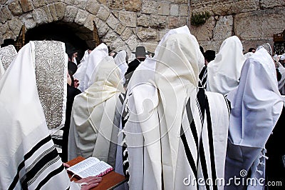 Orthodox Jewish men pray at the Western Wall in Jerusalem Israe Editorial Stock Photo