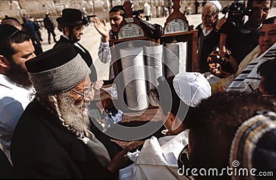 Orthodox jewish men pray at the Western Wall Editorial Stock Photo