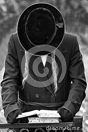 Orthodox Jewish prays, jews, judaism, hasidim. BW Stock Photo