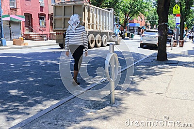 Orthodox Jewish woman Wearing Special Clothes on Shabbat, in Williamsburg, Brooklyn, New York Editorial Stock Photo