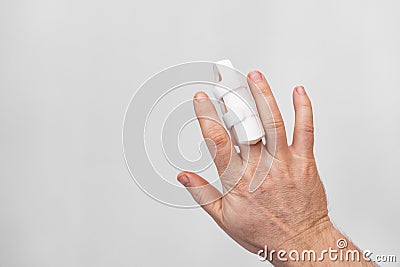orthosis for fixing the finger on hand on a white background Stock Photo