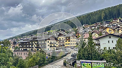 ORTISEI, ITALY. 18 SEPTEMBER 2023. Cloud-shrouded Ortisei, a quaint mountain town nestled in Italy's Dolomites Editorial Stock Photo