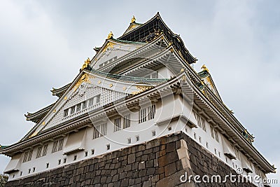 Osaka castle in cloudy sky before the rain fall down Stock Photo