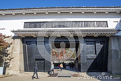 The ornate black and white Otemon entrance gate of Osaka Castle. Editorial Stock Photo