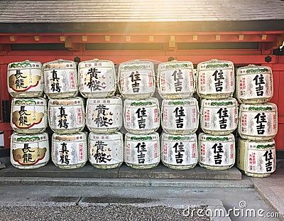 Osaka, Japan - February 14, 2017: Stack of Japanese wine sake Editorial Stock Photo