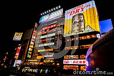 Colorful and eye-catching advertising neon signs billboards at Dotonburi area in night time. Editorial Stock Photo