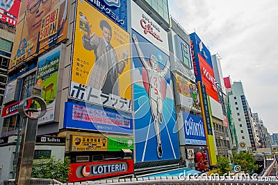 OSAKA, JAPAN - JULY 18, 2017: Day view of sign advertisements at Numba area, in a cloudy day in Osaka City, Japan Editorial Stock Photo