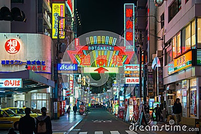 Osaka, Japan - November 13, 2017 :Tourist people walking in dotonbori street road in Namba dotonburi area Editorial Stock Photo