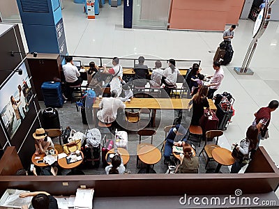 Osaka,Japan - September 12th,2016. People rest and relax at Starbuck& x27;s cafe at Kansai-Osaka airport Editorial Stock Photo