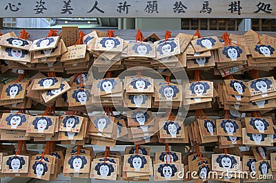 Wooden Ema`s votive plaques hanging at Tsuyunoten Shrine in Osaka Editorial Stock Photo