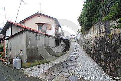 Property, town, road, village, neighbourhood, house, street, residential, area, alley, cottage, facade Editorial Stock Photo