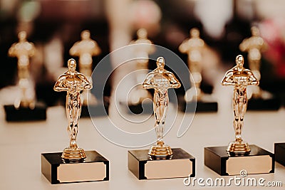 Oscar award. Prize for victory. Golden trophy,. Success concept. Horizontal shot. Prize in film production Editorial Stock Photo