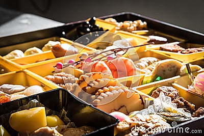 Osechi Ryori are traditional dishes enjoyed by Japanese people on New Year`s day. Stock Photo