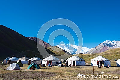 Morning Landscape of Lenin Peak 7134m at Tourist Yurt camp of Tulpar Kol Lake in Alay Valley, Osh, Kyrgyzstan. Editorial Stock Photo