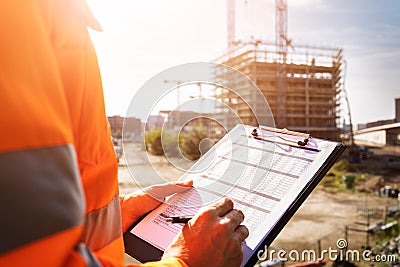 OSHA Inspection Worker At Construction Site Stock Photo