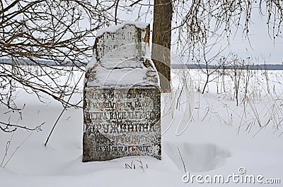 Oshevensk, Shiryaikha village, Russia, Febryary, 11, 2018. Tombstone at the burial place of merchant Druzhinin Peter Vasilyevich n Editorial Stock Photo