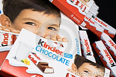 Oslo city, country Norway 06.09.2019 Kinder chocolate in different packages lies on a black isolated background Editorial Stock Photo