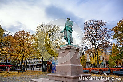 The Henrik Wergeland statue is located in the middle of a park in Oslo Editorial Stock Photo