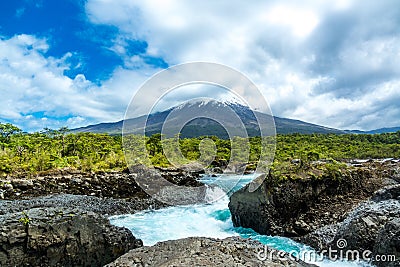 Osorno volcano view from Petrohue waterfall, Los Lagos landscape, Chile, South America Stock Photo