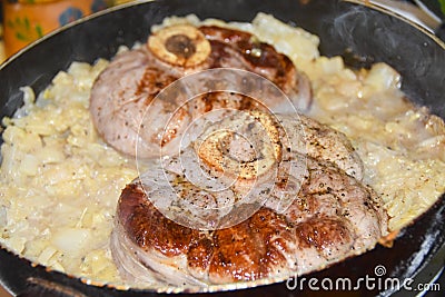 Ossobuko grilled beef with cabbage in a pan cooking dish Stock Photo