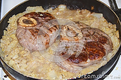 Ossobuko grilled beef with cabbage in a pan cooking dish Stock Photo