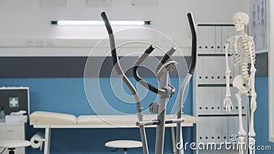 Osteopathy cabinet with electrical stationary bicycle Stock Photo