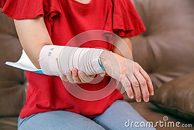 Osteoporosis splint with elastic bandage is applied to help keep the splint in place Stock Photo