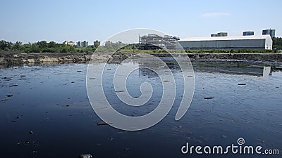 OSTRAVA, CZECH REPUBLIC, AUGUST 3, 2015: Former dump toxic waste, oil lagoon contamination water and soil Editorial Stock Photo