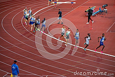 Male Runners Complete 1500m Distance in Track and Field Meet for Worlds in Budapest and Summer Editorial Stock Photo